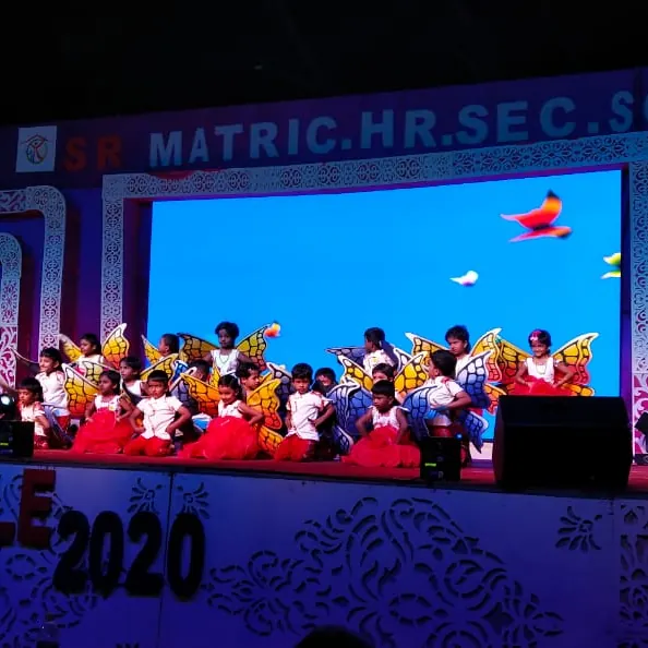 School annual day stage performance with full ensemble